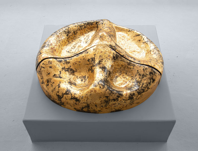 Sculpture "Peace of land" by the sculptor Anastasios Nyfadopoulos. The sculpture is made of Basalt fiber, Brass, Plant-based resin