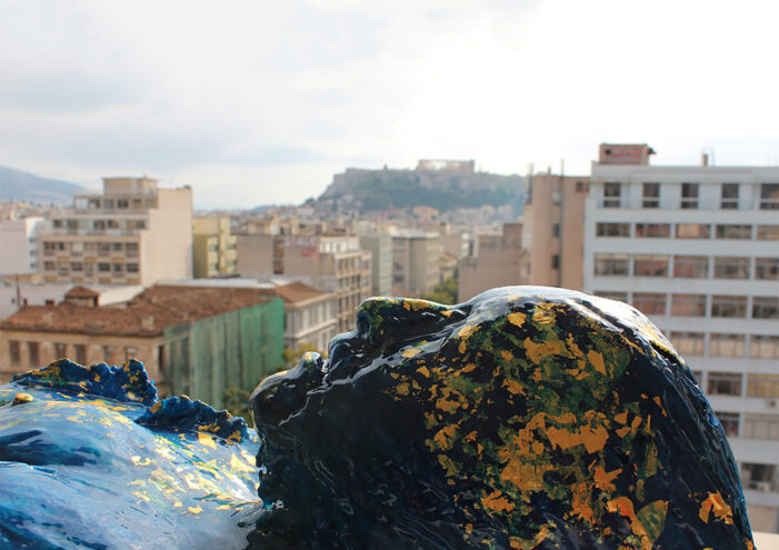 Sculpture "Embracing Fluidity" by the Greek artist Anastasios Nyfadopoulos across the Parthenon